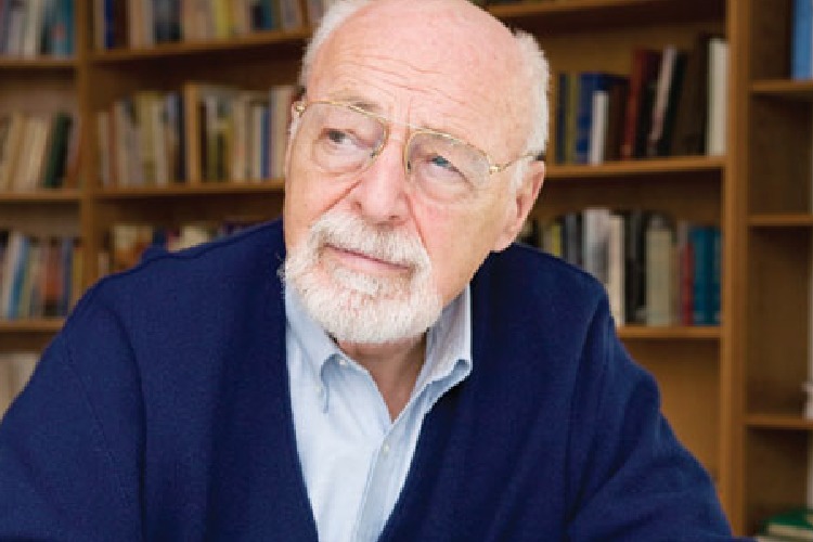 Senior man in library