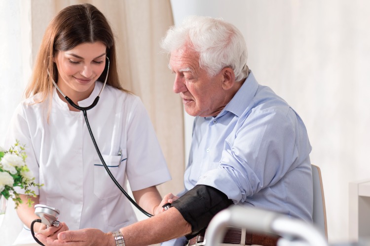 Skilled Nursing Man having his blood pressure checked