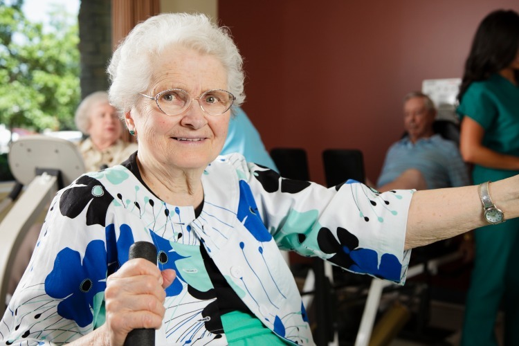 Female member using exercise machine