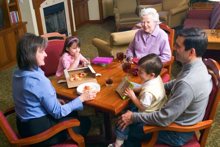 Grandmother with daughter and grandchildren