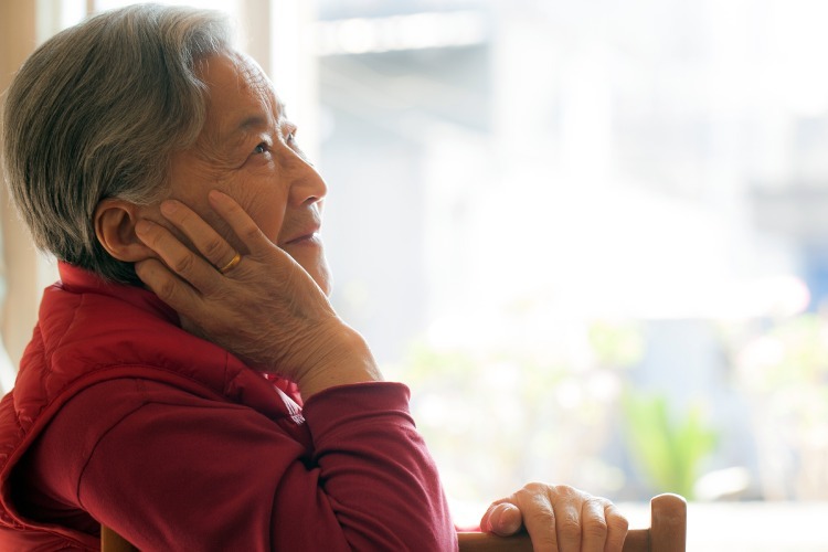 Woman gazing out window