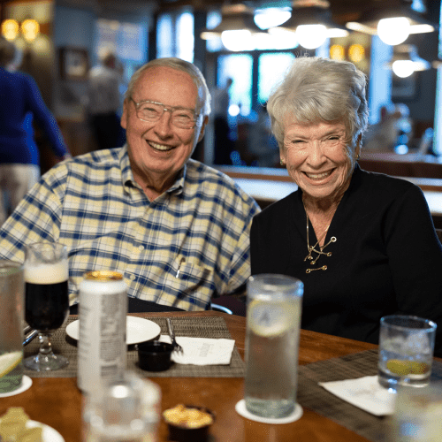 Couple having dinner at The Timbers