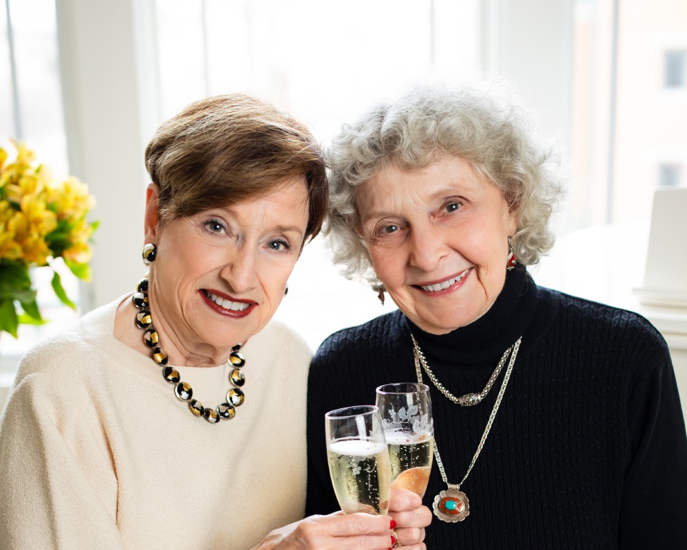 Sally and Nancy toasting champaign