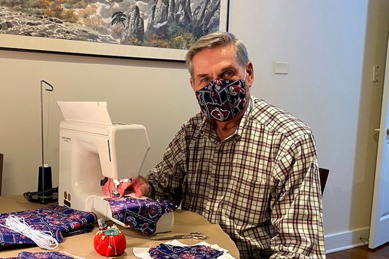 Sam Jeffers at the sewing machine