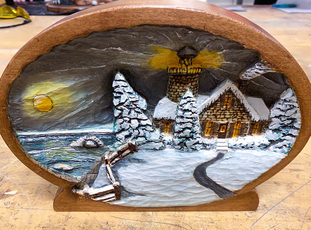 Winter logo cabin painted relief carving