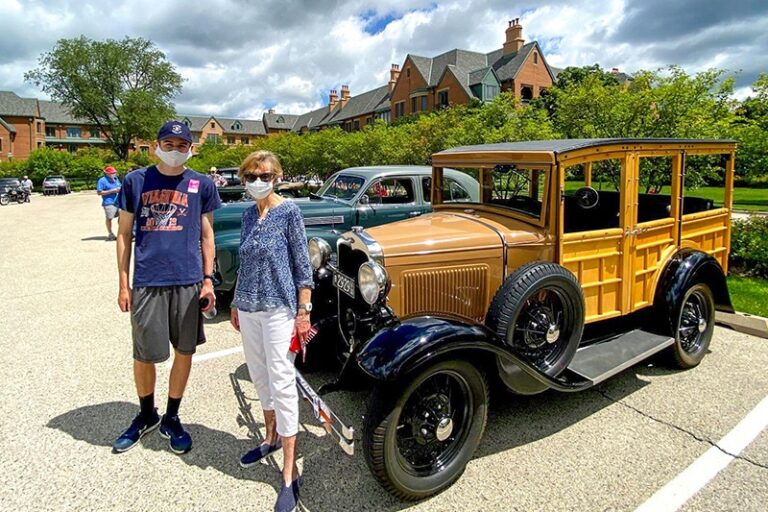 Garlands member and her son out enjoying the car show