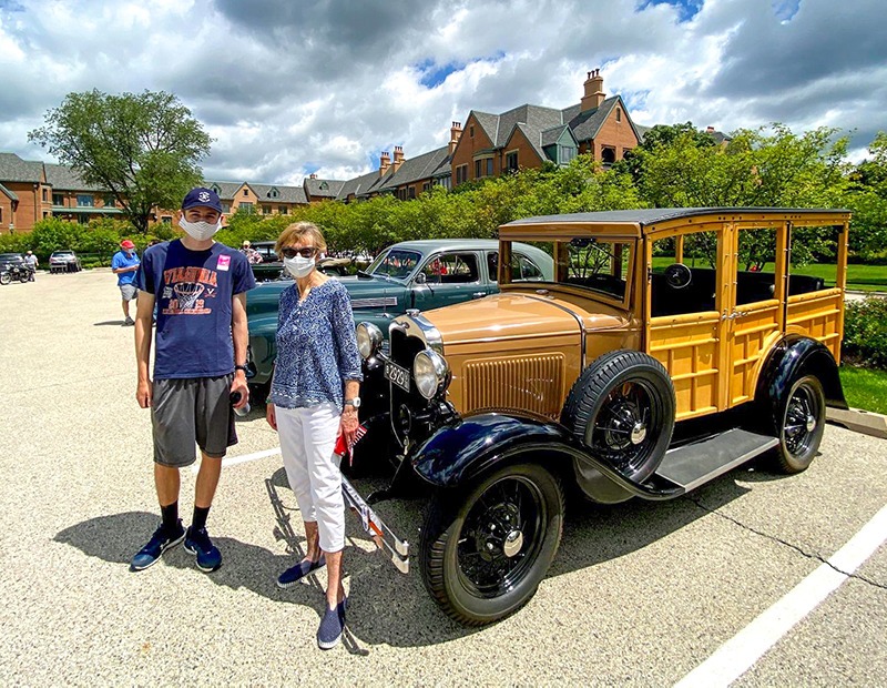 Garlands member and her son out enjoying the car show