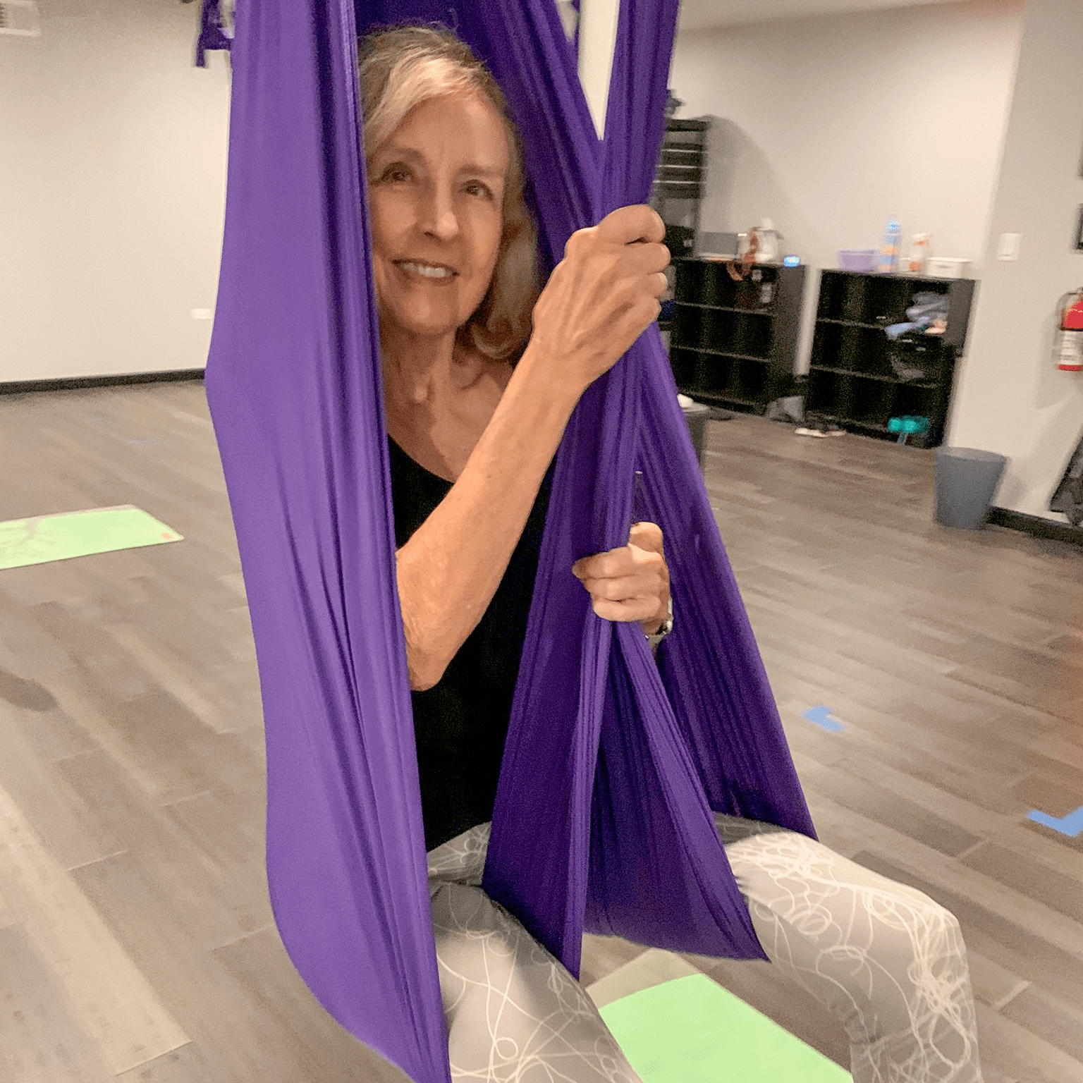 Garlands member, Deanne Born, hangs out at aerial yoga class.