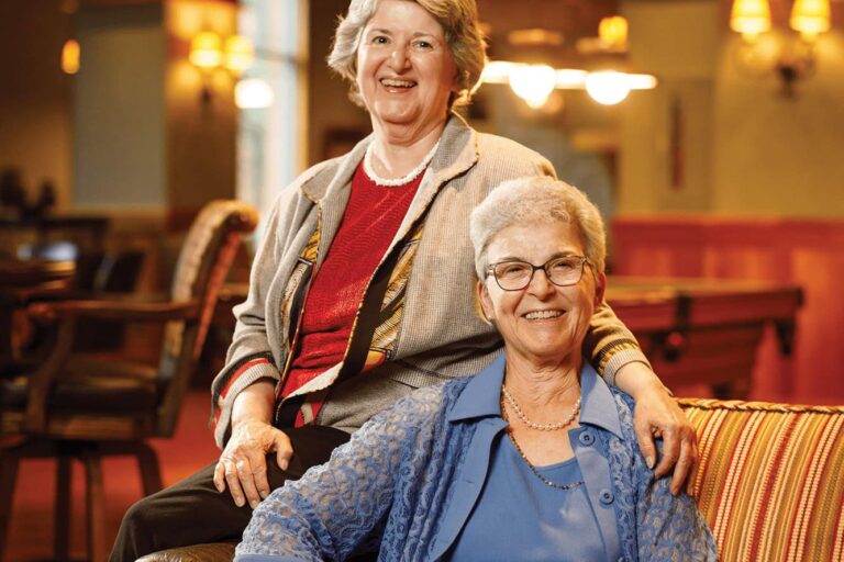 Sally Nutini posing with her sister MaryLou Nunamaker