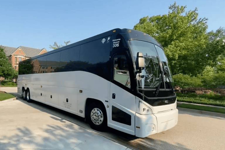 Coach Charter Bus ready for residents to board for travel club.