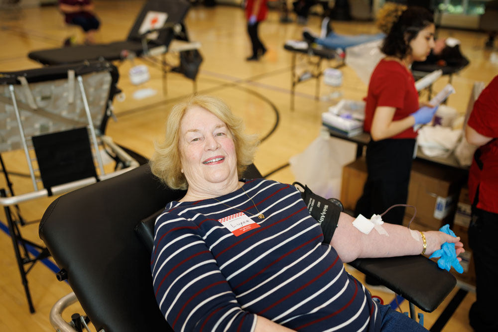 Lynn Backer giving blood