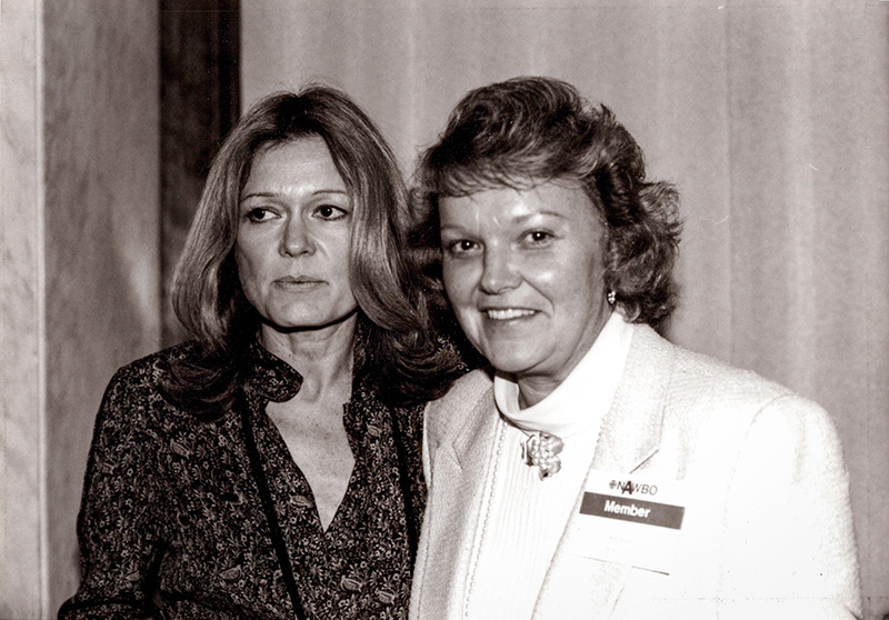 Linda Hughes posing with Gloria Seteinem