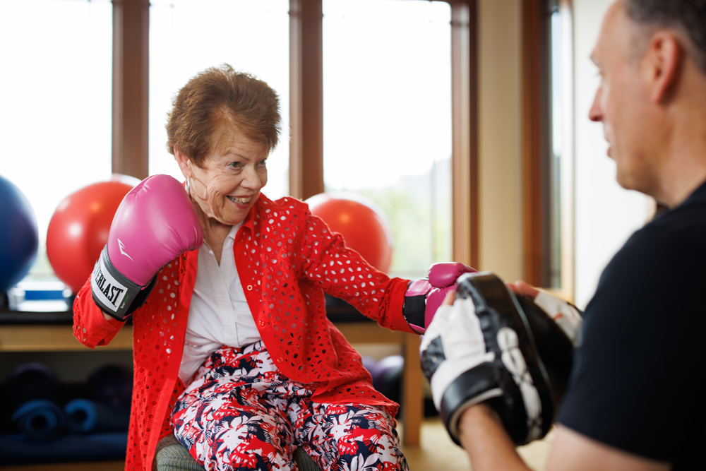 Punchlady Garlands Member with Parkinson's doing light Poxing