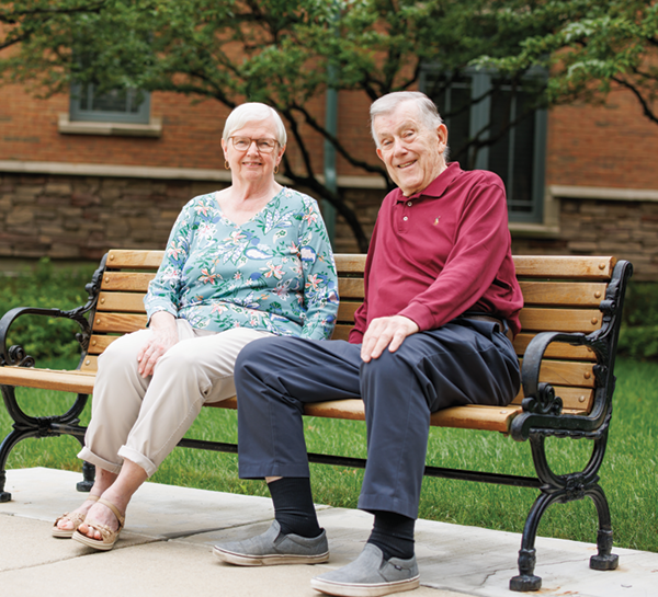 couple on a bench at The Garlands