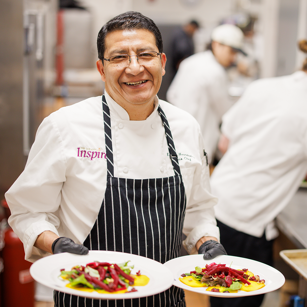 Chef holding two plates