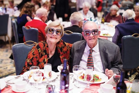 A couple at a Garlands Elton John themed event