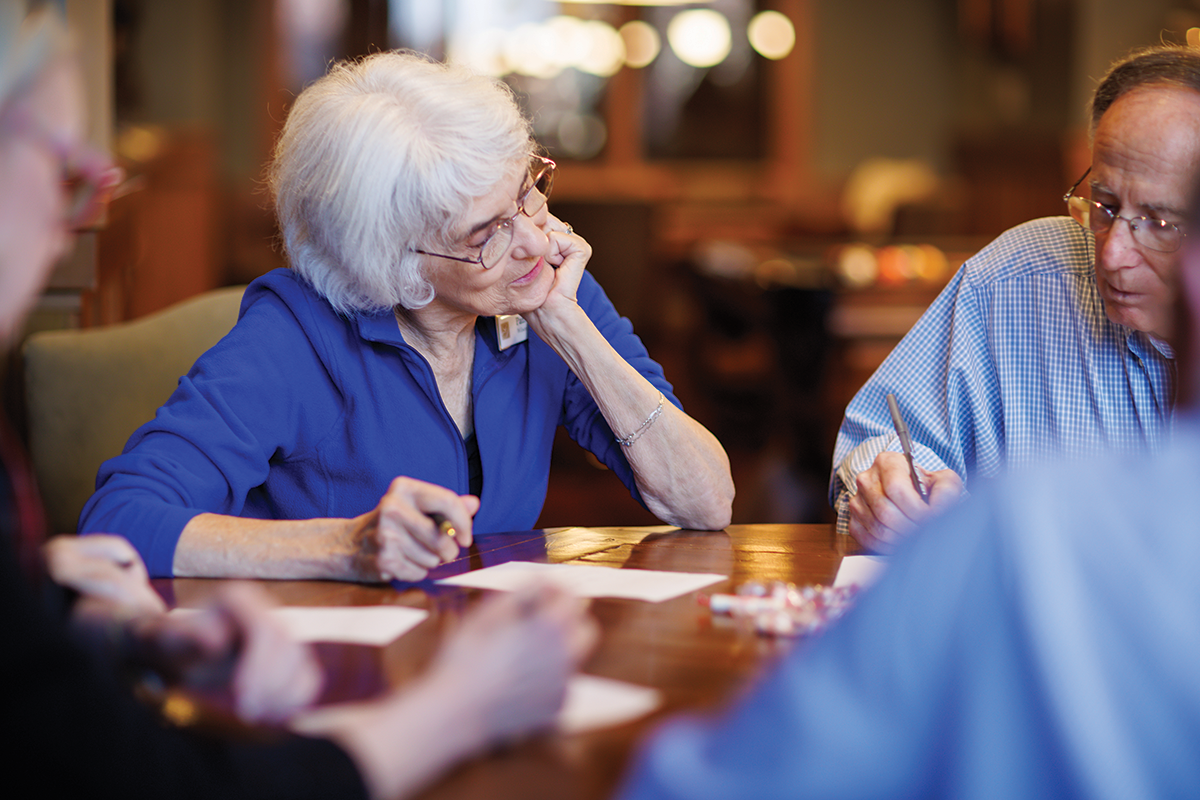 Woman at a lunch and learn event