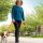 woman walking her dog outside at The Garlands