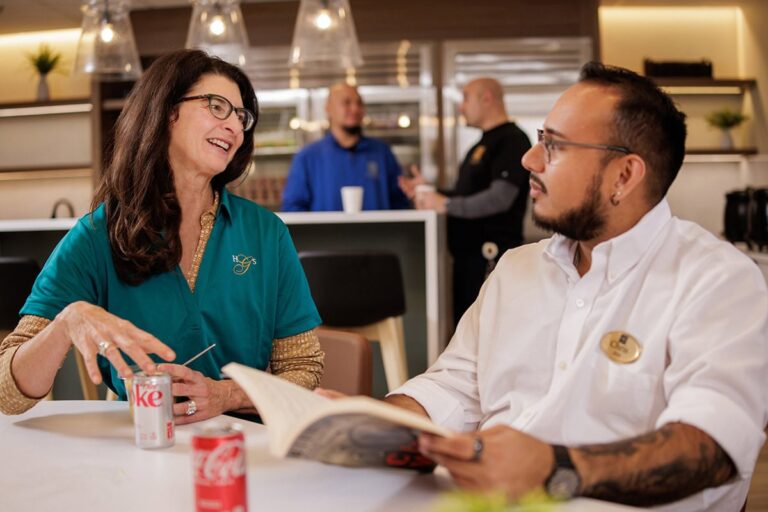 Lettuce Chat break room employees Two employees chatting in the new Lettuce Chat break room