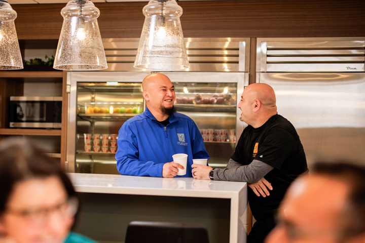 Staff chatting in the break room