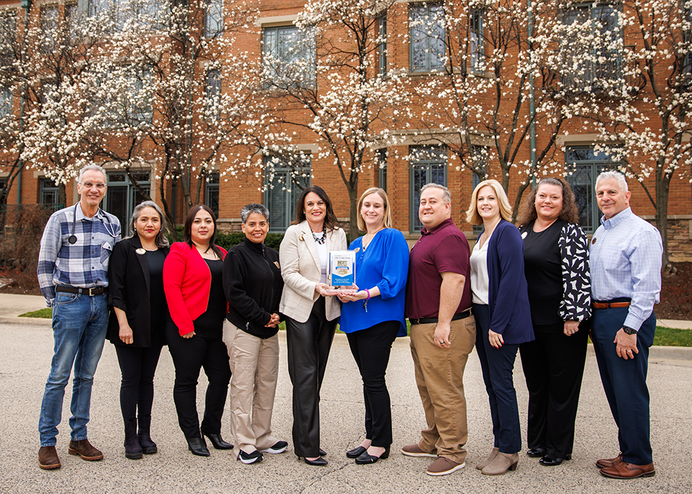 Staff at Prairieview holding US News award