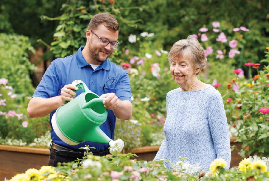 Artboard-3different team member and a member watering plants outside