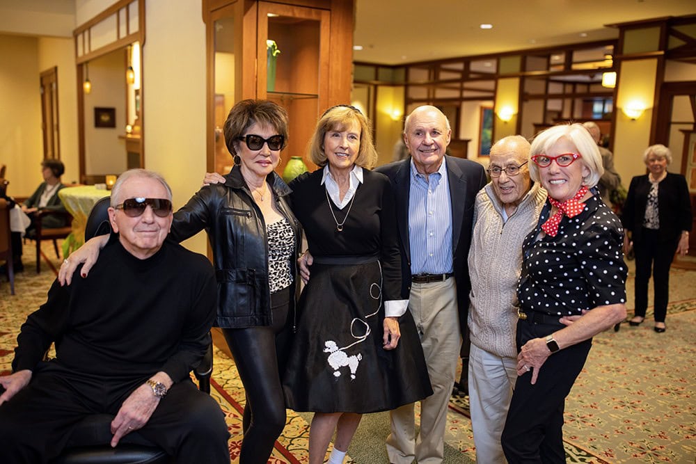 Friends gathering in the Robie Lounge