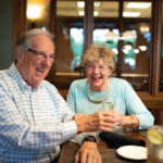 2 seniors having a drink in the bar